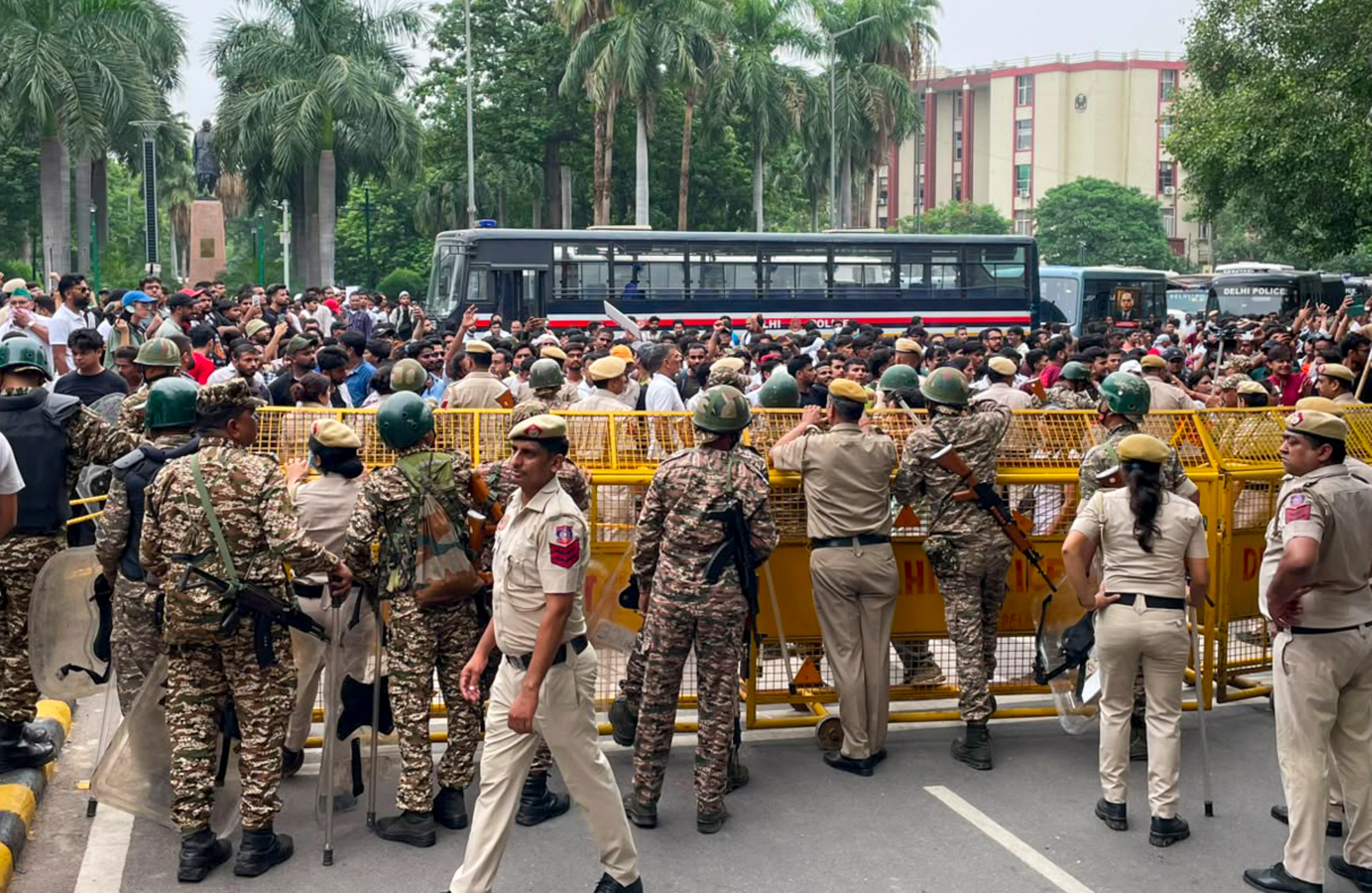 Security personnel stop supporters of the Cockroach Janata Party (CJP) during a protest march, at Sansad Marg, in Delhi, Monday, July 20, (PTI) Security personnel stop supporters of the Cockroach Janata Party (CJP) during a protest march, at Sansad Marg, in Delhi, Monday, July 20, (PTI)