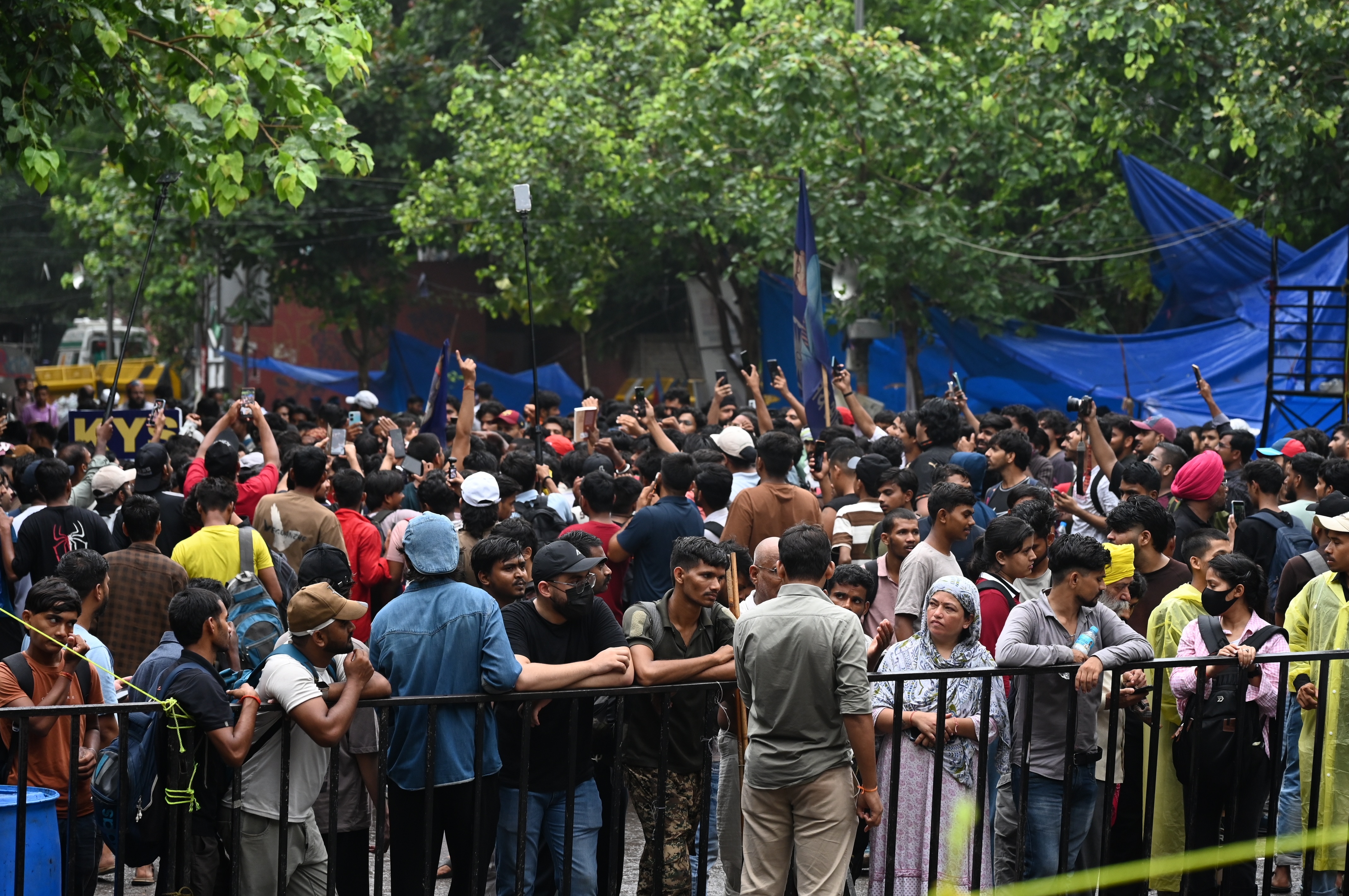 CJP supporters gather as they continue their protest demanding the resignation of education minister Dharmendra Pradhan. (PTI)