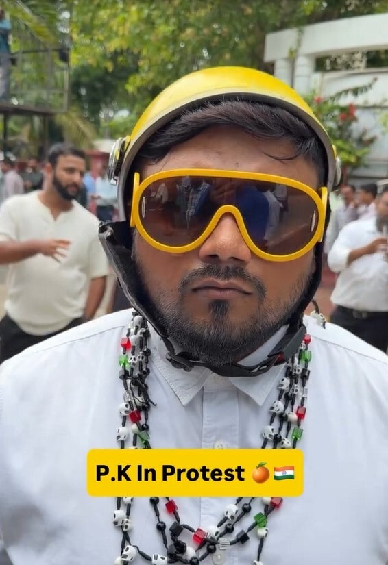 A protestor in Nagpur dressed up as Aamir Khan's alien character in the 2014 film PK
