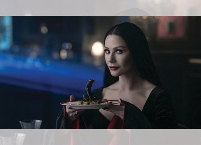 Nothing rattles Morticia Addams. Has any mommy looked this good in all-black? Nothing rattles Morticia Addams. Has any mommy looked this good in all-black?