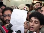 Cockroach Janta Party's (CJP) spokespersons Saurav Das and Ashutosh Ranka speak to the media after a meeting with the central government's ministers at the Constitution Club of India, in New Delhi on Friday.