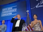 President Donald Trump attends the White House Correspondents' Association Dinner, at the Waldorf Astoria Washington DC, Friday, July 24, 2026, in Washington, with with WHCA president Weijia Jiang, right and White House press secretary Karoline Leavitt. (AP Photo/Rod Lamkey, Jr.)