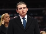 Barron Trump allegedly admired Andrew Tate, communicating via Zoom in 2024, while Donald Trump Jr. met him at Trump Tower in 2017. Calls for investigation into possible ties to the Tate brothers have emerged, raising questions about influence and official actions.