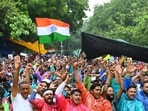 New Delhi, India � July 24, 2026: Supporters of the Cockroach Janata Party (CJP) brave the rain as they gather to support the party's protest and listen to Abhijeet Dipke in New Delhi, India, on Friday, July 24, 2026. The protest was held over the NEET paper leak controversy and related demands. (Photo by Vipin Kumar/Hindustan Times)(Hindustan Times)