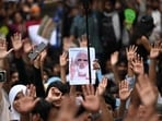 Cockroach Janta Party (CJP) supporters shout slogans at Jantar Mantar in New Delhi on July 24, 2026 during the ongoing protest to demand the resignation of education minister Dharmendra Pradhan over alleged NEET exam irregularities. (AFP)