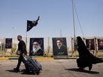 Iranians cross over to Iraq through the Shalamcheh border on July 23.
