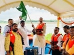 Mayor Ashok Tiwari flagging off e-boat at Namo Ghat, Varanasi. (HT Photo)