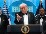 Donald Trump speaks at the White House after the April 25, 2026 shooting incident at the White House Correspondents' Association dinner, as acting Attorney General Todd Blanche and FBI Director Kash Patel listen.