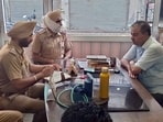 Police investigating at the spot after atleast six robbers robbed  <span class='webrupee'>₹</span>2.30 lakh, gold ring and a mobile phone from the clinic cum house of a doctor in Jagraon on Thursday. (HT Photo)