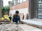 The authority has also started removing encroachment on drains in Sector 19, which will also be undertaken in other areas, officials said. (Sunil Ghosh/HT Photo)