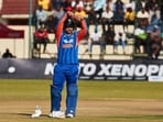 India's Vaibhav Sooryavanshi gestures as he celebrates 50 runs during the first T20I vs Zimbabwe.