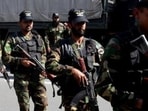 Militant attack kills 15 at security check post in north-west Pakistan.