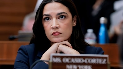 Alexandria Ocasio-Cortez stated Mitch McConnell should either give a health update or resign, stressing public officials' obligation to inform constituents. (Getty Images via AFP) Alexandria Ocasio-Cortez stated Mitch McConnell should either give a health update or resign, stressing public officials' obligation to inform constituents. (Getty Images via AFP)