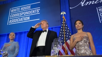 President Donald Trump attends the White House Correspondents' Association Dinner with WHCA President Jiang Weijia (right) and White House Press Secretary Carolyn Leavitt on Friday, July 24, 2026, in Washington. (AP Photo/Rod Lamkey, Jr.) (AP Photo/Rod Lamkey)