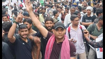 Assistant prof Mohit Bhardwaj (in black cap) at the protest site in Delhi. (SOURCED) Assistant prof Mohit Bhardwaj (in black cap) at the protest site in Delhi. (SOURCED)