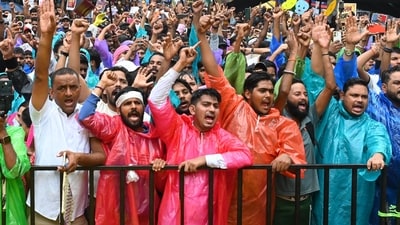 New Delhi, India � July 24, 2026: Supporters of the Cockroach Janata Party (CJP) brave the rain as they gather to support the party's protest and listen to Abhijeet Dipke in New Delhi, India, on Friday, July 24, 2026. The protest was held over the NEET paper leak controversy and related demands. (Photo by Vipin Kumar/Hindustan Times) (Hindustan Times) New Delhi, India � July 24, 2026: Supporters of the Cockroach Janata Party (CJP) brave the rain as they gather to support the party's protest and listen to Abhijeet Dipke in New Delhi, India, on Friday, July 24, 2026. The protest was held over the NEET paper leak controversy and related demands. (Photo by Vipin Kumar/Hindustan Times) (Hindustan Times)