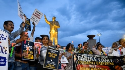 Students, activists and members of various civil society organizations take part in a candlelight solidarity rally in support of climate activist Sonam Wangchuk, demanding the protection of students' rights and raising concerns about the work of the National Testing Agency (NTA). (PTI)