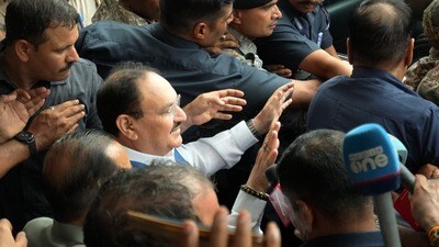 సమావేశం అనంతరం బయటకు వెళుతున్న కేంద్ర మంత్రులు జేపీ నడ్డా, జితేంద్ర సింగ్ (PTI)