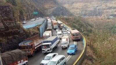 Pune, India - Feb. 20, 2016 : Massive traffic jam at Pune-Mumbai Expressway after an oil tanker toppled blocking the busy road route near Khandala exit in Pune, India, on Saturday, February 20, 2016. Traffic on Mumbai-Pune express way was restored after nine hours on Saturday after it was virtually standstill since morning. Vehicular movement from Mumbai and Pune remained affected when an oil tanker turned turtle around 6 am on stiff slope near Khandala exit.. Oil spilled over one km area, forcing authorities to block the road. Traffic was diverted from old national highway. But long queue -- almost eight to ten kms - from both the ends was seen till noon. It took almost six to eight hours to pass express way, which took 150 minutes in normal circumstance. Vehicle users faced severe hardships due to the mishap. HT photo (HT Photos) Pune, India - Feb. 20, 2016 : Massive traffic jam at Pune-Mumbai Expressway after an oil tanker toppled blocking the busy road route near Khandala exit in Pune, India, on Saturday, February 20, 2016. Traffic on Mumbai-Pune express way was restored after nine hours on Saturday after it was virtually standstill since morning. Vehicular movement from Mumbai and Pune remained affected when an oil tanker turned turtle around 6 am on stiff slope near Khandala exit.. Oil spilled over one km area, forcing authorities to block the road. Traffic was diverted from old national highway. But long queue -- almost eight to ten kms - from both the ends was seen till noon. It took almost six to eight hours to pass express way, which took 150 minutes in normal circumstance. Vehicle users faced severe hardships due to the mishap. HT photo (HT Photos)