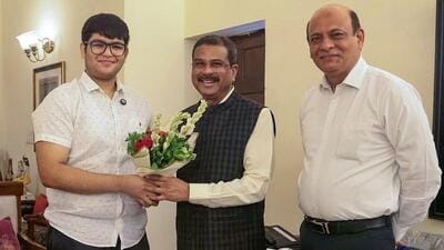 Union education minister Dharmendra Pradhan (centre) with Panshul Bansal of Haryana, who secured AIR 2 in NEET UG 2026. (X) Union education minister Dharmendra Pradhan (centre) with Panshul Bansal of Haryana, who secured AIR 2 in NEET UG 2026. (X)