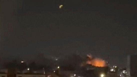 Smoke and flames rise after an explosion in Bandar Abbas, Hormozgan Province, Iran. (REUTERS)