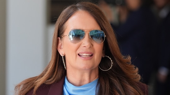 Agriculture Secretary Brooke Rollins arrives before President Donald Trump speaks at an event in the Rose Garden of the White House.