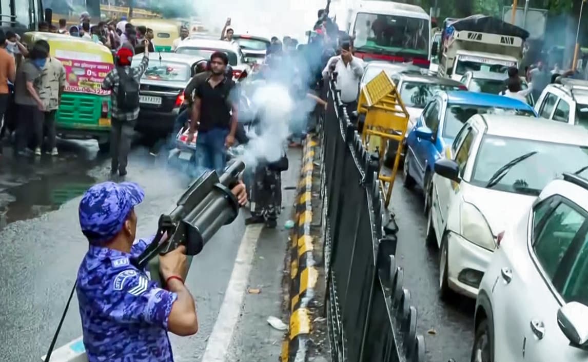 RAF fires tear gas shells on protestors, in Delhi, (ANI) RAF fires tear gas shells on protestors, in Delhi, (ANI)
