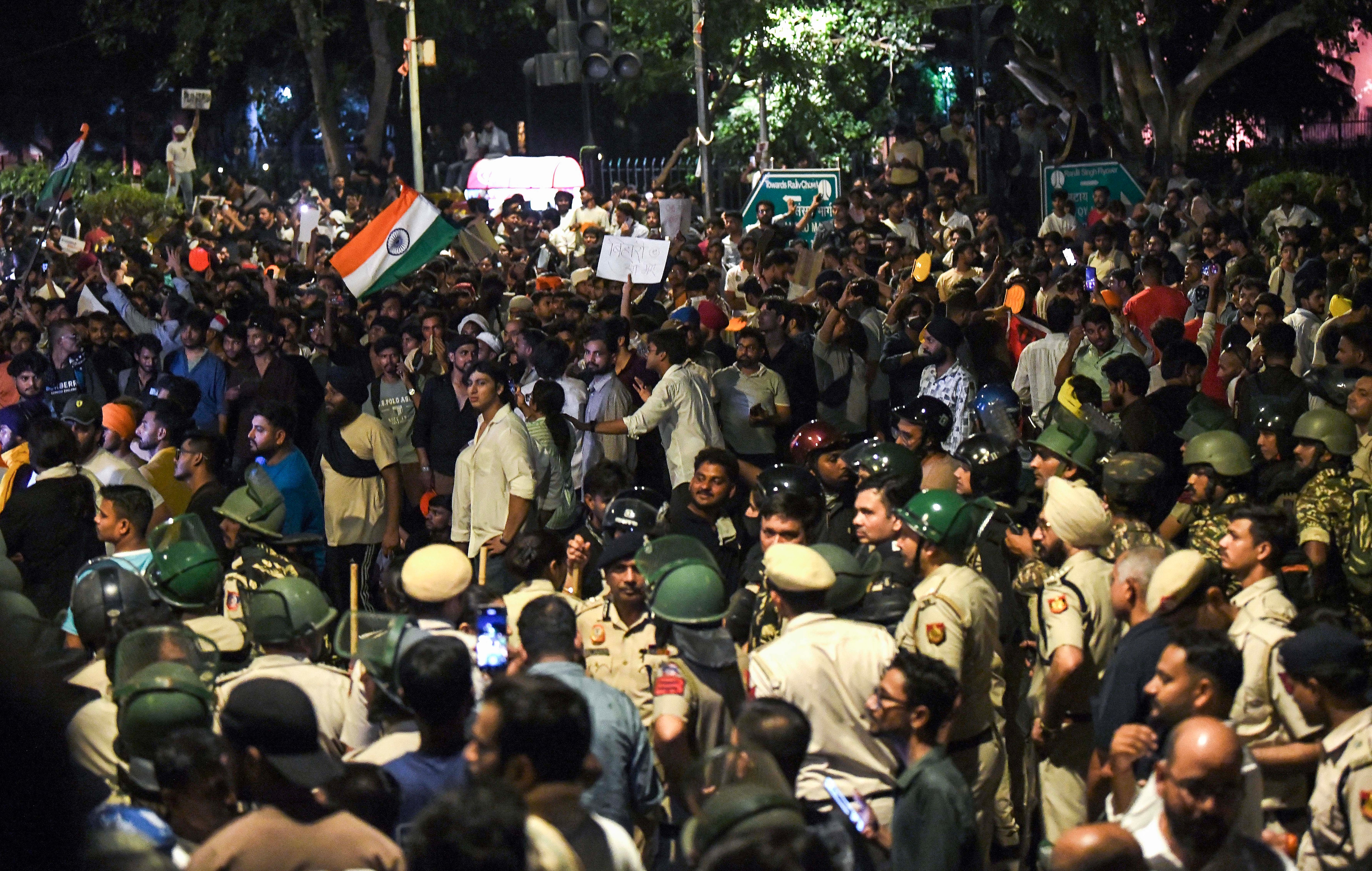 Heavy police forces have been deployed as protesters in large numbers continue their protest in support of the Cockroach Janata Party (CJP), demanding the resignation of Union Education Minister Dharmendra Pradhan over alleged examination irregularities and leaking of NEET (ANI) papers. Heavy police forces have been deployed as protesters in large numbers continue their protest in support of the Cockroach Janata Party (CJP), demanding the resignation of Union Education Minister Dharmendra Pradhan over alleged examination irregularities and leaking of NEET (ANI) papers.