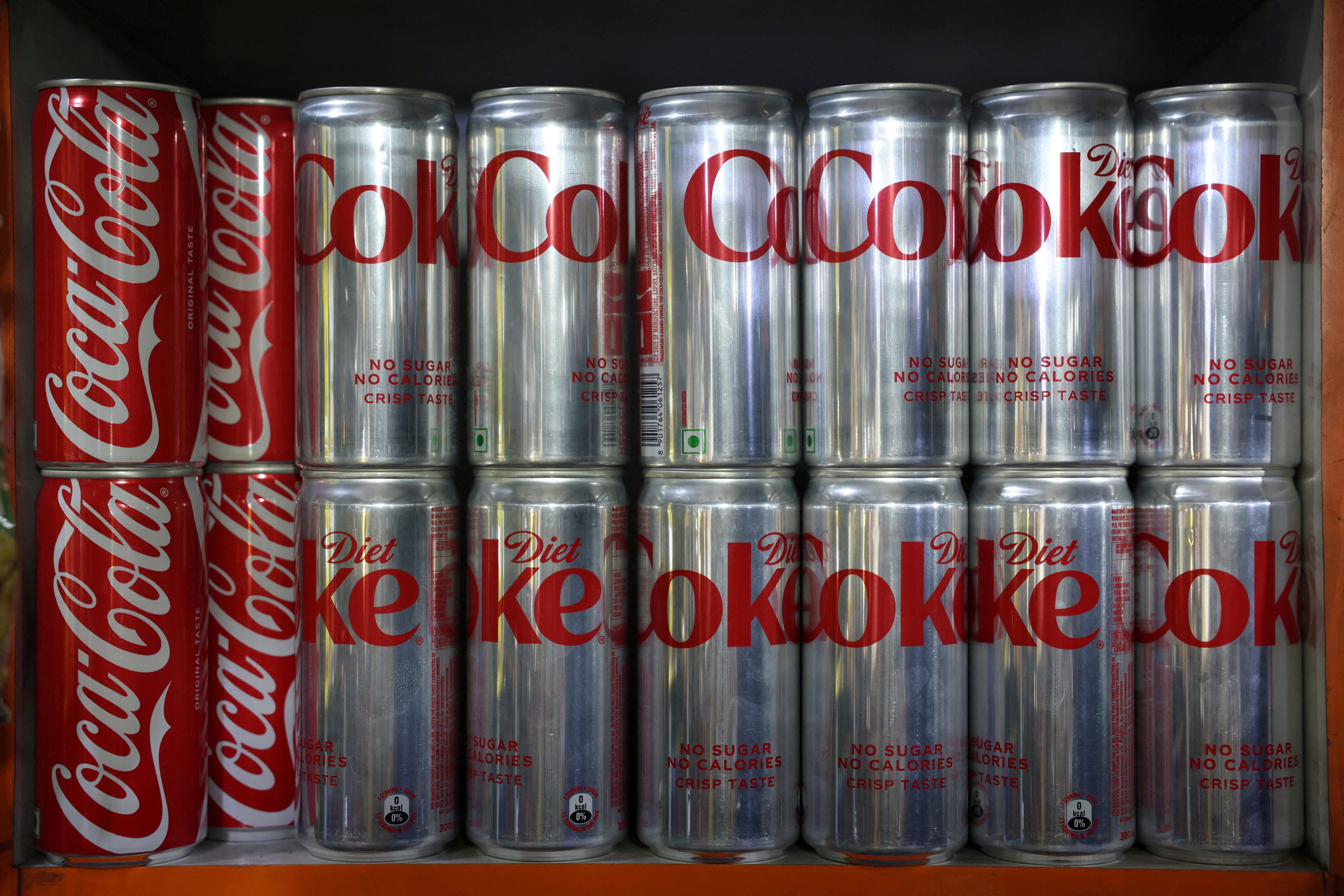 Diet Coke cans on display for sale inside a shop in New Delhi. (Reuters Photo)