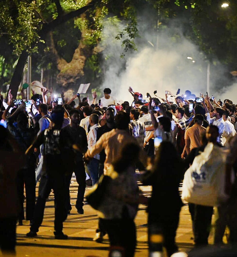 Police personnel use tear gas to disperse protesters during a Cockroach Janata Party (CJP) demonstration in Jantar Mantar on Wednesday, July 22 (Hindustan Times) Police personnel use tear gas to disperse protesters during a Cockroach Janata Party (CJP) demonstration in Jantar Mantar on Wednesday, July 22 (Hindustan Times)