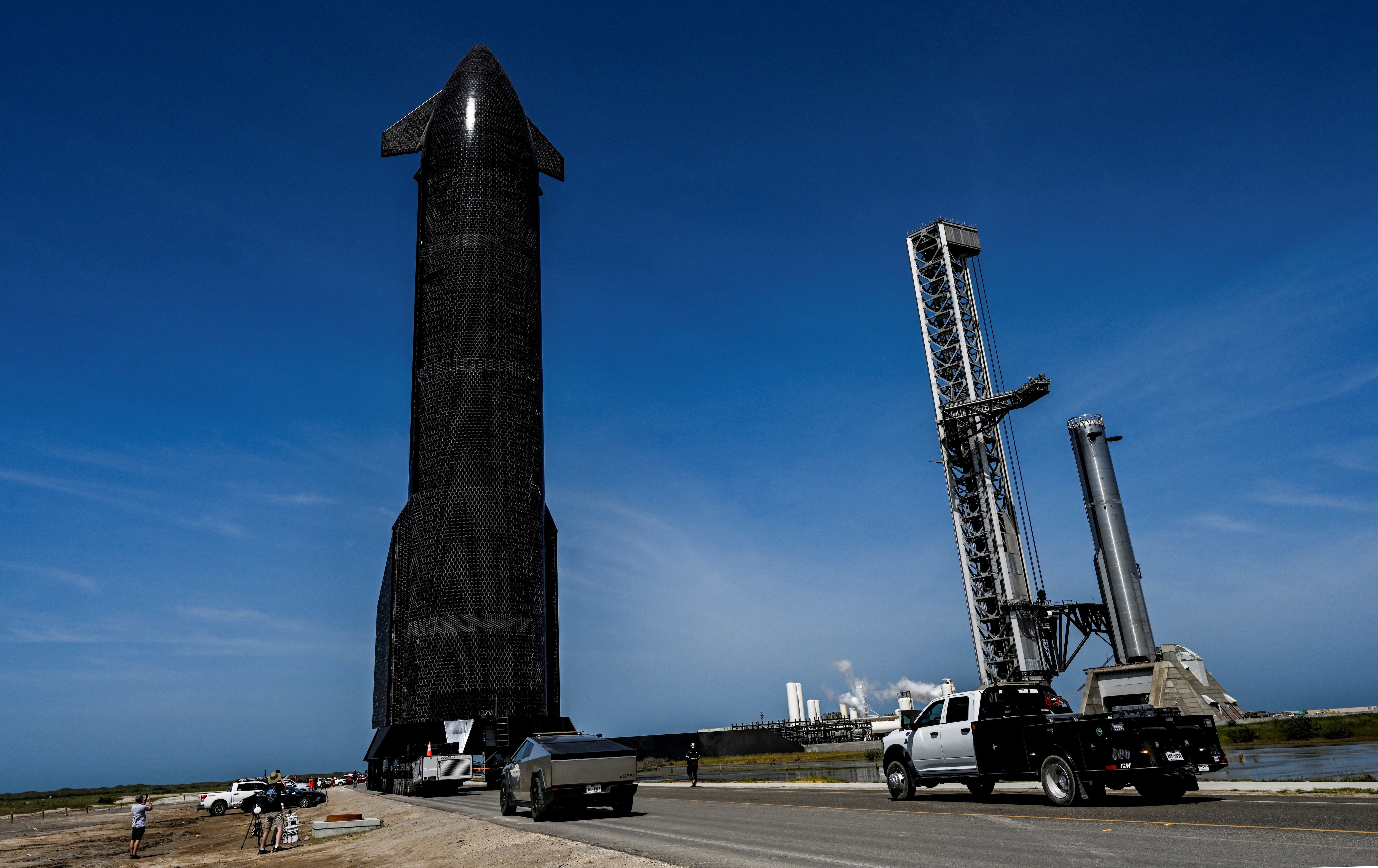 Starship 40 rolls toward the SpaceX launch complex as preparations continue for the second attempt of the 13th test flight of the Starship spacecraft and the Super Heavy v3 booster in Starbase, Texas, U.S., July 22, 2026. REUTERS/Steve Nesius (REUTERS)