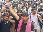 Assistant prof Mohit Bhardwaj (in black cap) at the protest site in Delhi. (SOURCED)