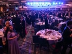 Attendees are seen inside the ballroom after shots were reportedly fired during the White House Correspondents' dinner at the Washington Hilton in Washington, DC, on April 25, 2026.