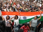 People participate in a Tiranga protest organised by the Cockroach Janta Party (CJP).