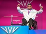 Jhandu Kumar celebrates after winning the bronze medal.