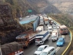 Pune, India - Feb. 20, 2016 : Massive traffic jam at Pune-Mumbai Expressway after an oil tanker toppled blocking the busy road route near Khandala exit in Pune, India, on Saturday, February 20, 2016. Traffic on Mumbai-Pune express way was restored after nine hours on Saturday after it was virtually standstill since morning. Vehicular movement from Mumbai and Pune remained affected when an oil tanker turned turtle around 6 am on stiff slope near Khandala exit.. Oil spilled over one km area, forcing authorities to block the road. Traffic was diverted from old national highway. But long queue -- almost eight to ten kms - from both the ends was seen till noon. It took almost six to eight hours to pass express way, which took 150 minutes in normal circumstance. Vehicle users faced severe hardships due to the mishap. HT photo (HT Photos)