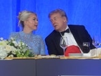 President Donald Trump talks with White House press secretary Karoline Leavitt at the White House Correspondents' Association dinner at the Waldorf Astoria Washington DC.