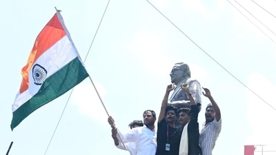 Tej Pratap Yadav stands atop the statue of former Mauritius Prime Minister Seewoosagur Ramgoolam during the 'Bihar Bandh' called over the alleged NEET paper leak and police action against protesting students, at Ram Gulam Chowk, in Patna, Bihar, Saturday, July,25, 2026. (Santosh Kumar/ Hindustan Times) )