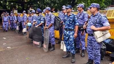 Several videos have circulated online, particularly from police action on July 20, of protesters questioning both CRPF personnel for not wearing their name tags (ANI) Several videos have circulated online, particularly from police action on July 20, of protesters questioning both CRPF personnel for not wearing their name tags (ANI)