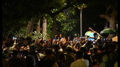 At around 10.15PM on Saturday, police estimated that a crowd of 4,000 people remained at the site. (Sanchit Khanna/HT Photo)