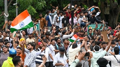 New Delhi, India - July 24, 2026: Supporters of the Cockroach Janata Party (CJP) gather during a protest at Jantar Mantar demanding the resignation of Union Education Minister Dharmendra Pradhan over alleged irregularities in the NEET examination, in New Delhi, India, on Friday, July 24, 2026. (Photo by Sanjeev Verma/ Hindustan Times) (Hindustan Times) New Delhi, India - July 24, 2026: Supporters of the Cockroach Janata Party (CJP) gather during a protest at Jantar Mantar demanding the resignation of Union Education Minister Dharmendra Pradhan over alleged irregularities in the NEET examination, in New Delhi, India, on Friday, July 24, 2026. (Photo by Sanjeev Verma/ Hindustan Times) (Hindustan Times)