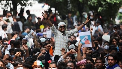 Supporters of the Cockroach Janta Party (CJP) celebrate after Education Minister Dharmendra Pradhan resigned. (Reuters)