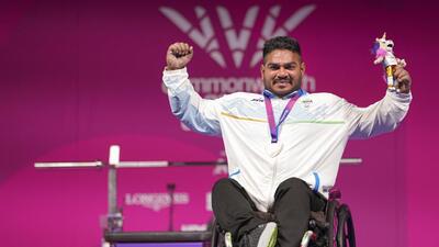 India's Jhandu Kumar celebrates after winning the bronze medal during the medal ceremony for the men's heavyweight para powerlifting event at the Commonwealth Games 2026, in Glasgow, Friday (PTI) India's Jhandu Kumar celebrates after winning the bronze medal during the medal ceremony for the men's heavyweight para powerlifting event at the Commonwealth Games 2026, in Glasgow, Friday (PTI)