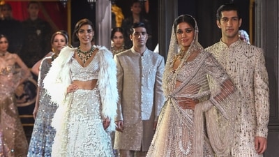 Masterful craftsmanship, intricate embellishment, and contemporary glamour defined every silhouette. (PTI) Masterful craftsmanship, intricate embellishment, and contemporary glamour defined every silhouette. (PTI)
