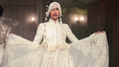 Velvet, florals, pearl embellishments, and regal silhouettes came alive on the ramp during Rohit Bal's showcase. (PTI) Velvet, florals, pearl embellishments, and regal silhouettes came alive on the ramp during Rohit Bal's showcase. (PTI)