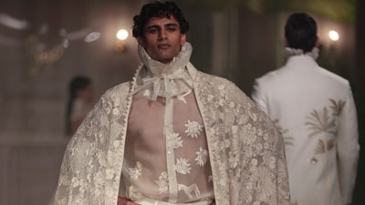The palette stayed close to the house's known comfort zone of black, deep red, and occasionally opening up into soft ivory and white. (PTI) The palette stayed close to the house's known comfort zone of black, deep red, and occasionally opening up into soft ivory and white. (PTI)