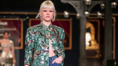 Another gorgeous look was a pair of denim jeans embroidered with faux fur, paired with an embroidered jacket left open on the front. (PTI) Another gorgeous look was a pair of denim jeans embroidered with faux fur, paired with an embroidered jacket left open on the front. (PTI)