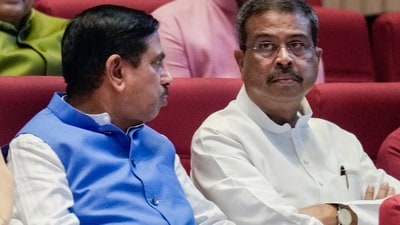 ప్రహ్లాద్ జోషి, ధర్మేంద్ర ప్రధాన్ (PTI File photo)