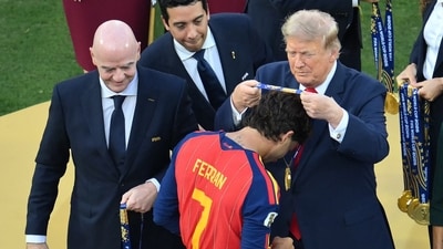Donald Trump reacts to Ferran Torres' 'Make Spain Great Again' cap after Spain's World Cup triumph. (AFP) Donald Trump reacts to Ferran Torres' 'Make Spain Great Again' cap after Spain's World Cup triumph. (AFP)