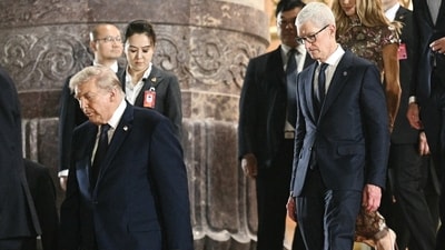 President Trump and Apple CEO Tim Cook during the president’s state visit to China in May.
